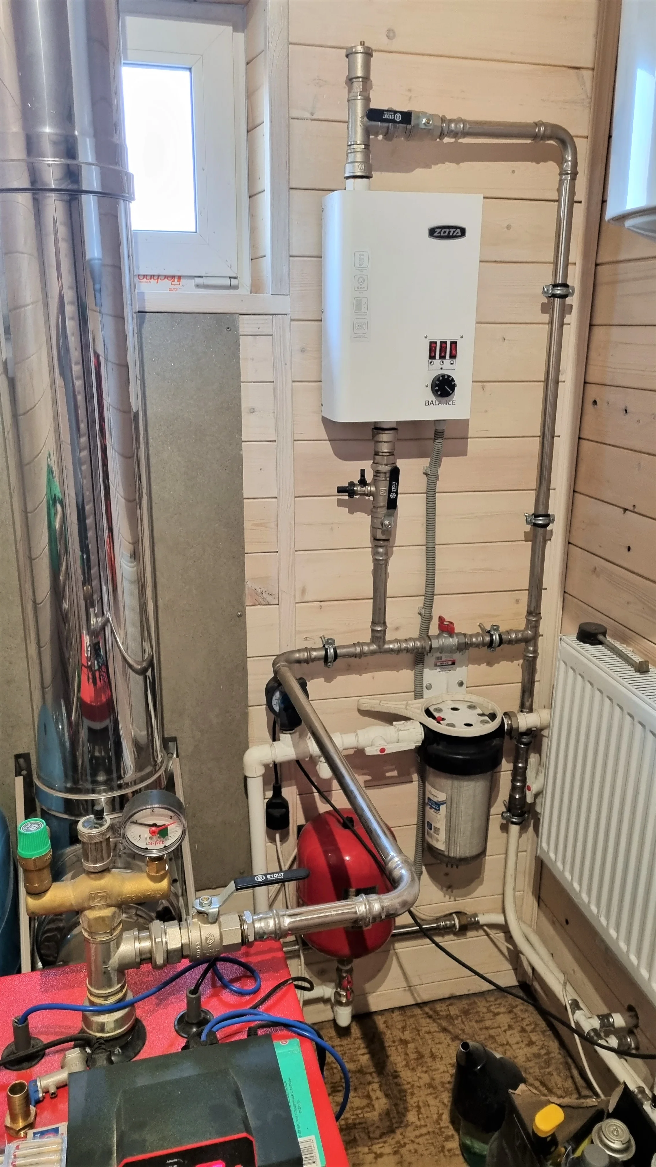 Фото - Котел Heiztechnik HT Classic Plus 30 кВт (контроллер Heiztechnik Logic 105 / комплект чугунных колосников / вентилятор  WPA06+переходной патрубок / инструмент для чистки)
